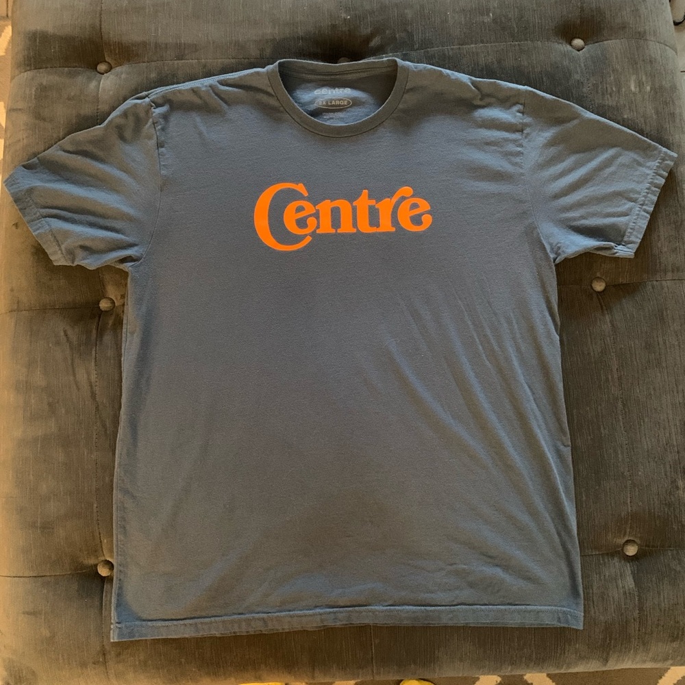 Gently Used Centre Blue shirt with orange letters Size XXL